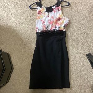 Nice business dress. Floral on top.